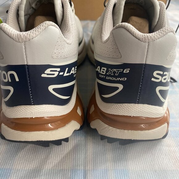 Salomon Sneakers Are Light Gray With Black Laces. - Picture 6 of 9